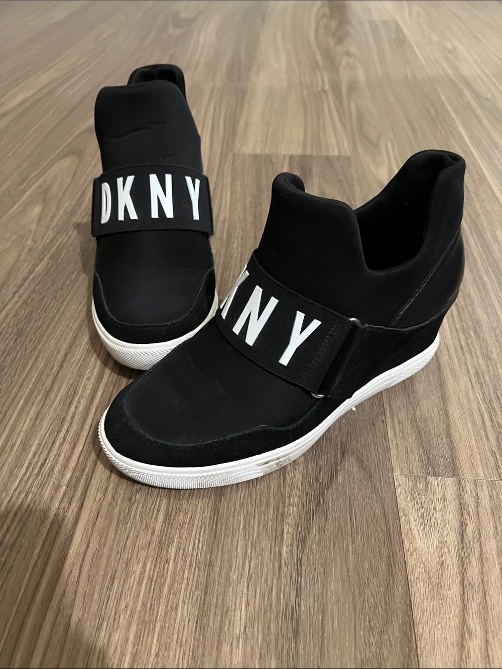 DKNY Black and White Logo Strap Slip-On Wedge Sneakers